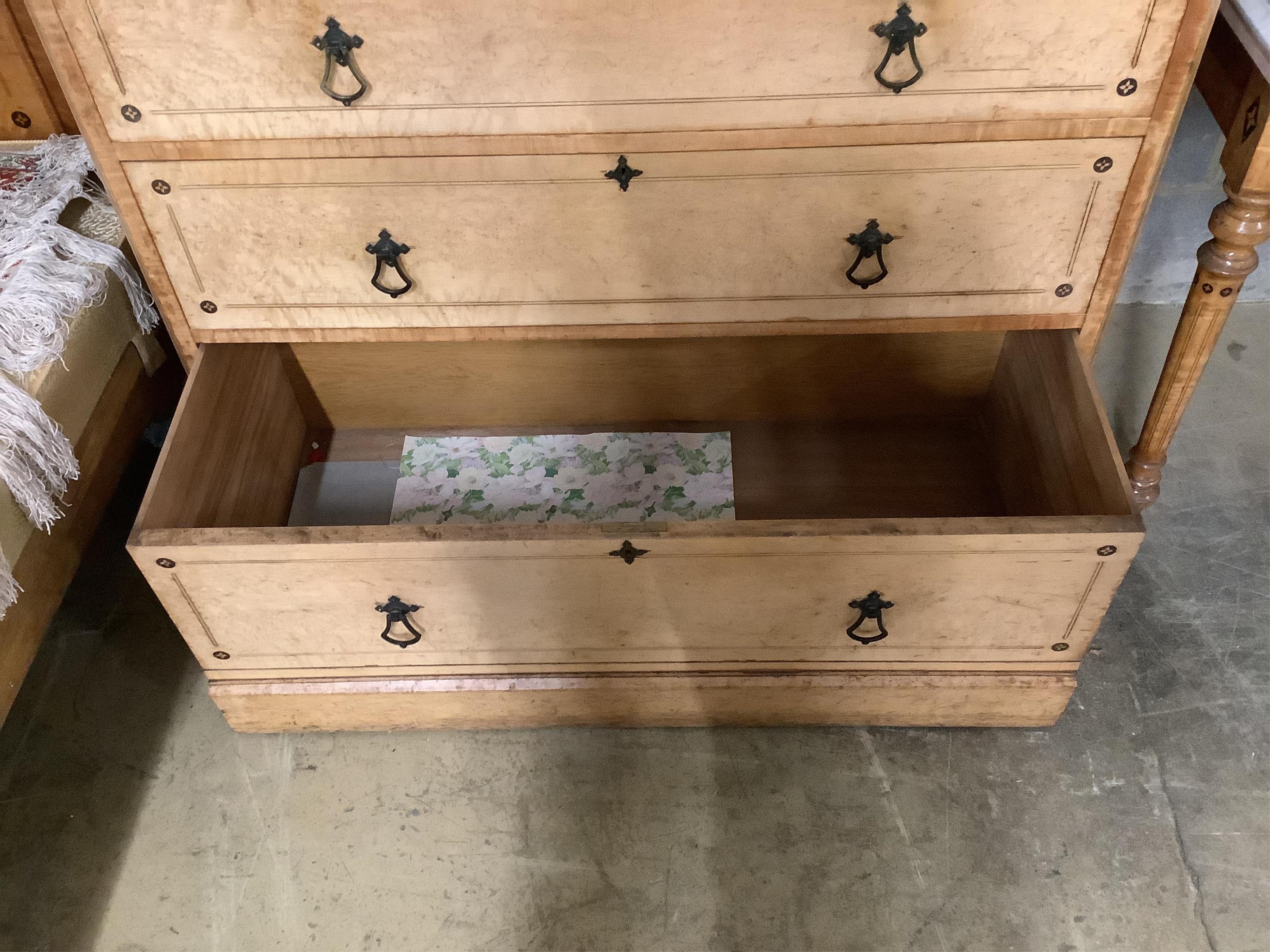 A late Victorian Gothic revival ebony inlaid, bird's eye maple bedroom suite, manner of Charles Bevan, comprising 5ft bed frame, kneehole dressing table, chest of drawers, marble top washstand, bedside cabinet, commode a